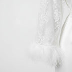 Ensemble Pyjama Satiné à Plumes – Élégance Nocturne